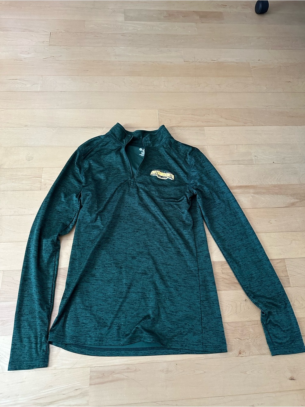 UVM official merch - Women’s Green Quarter-Zip Performance Pullover